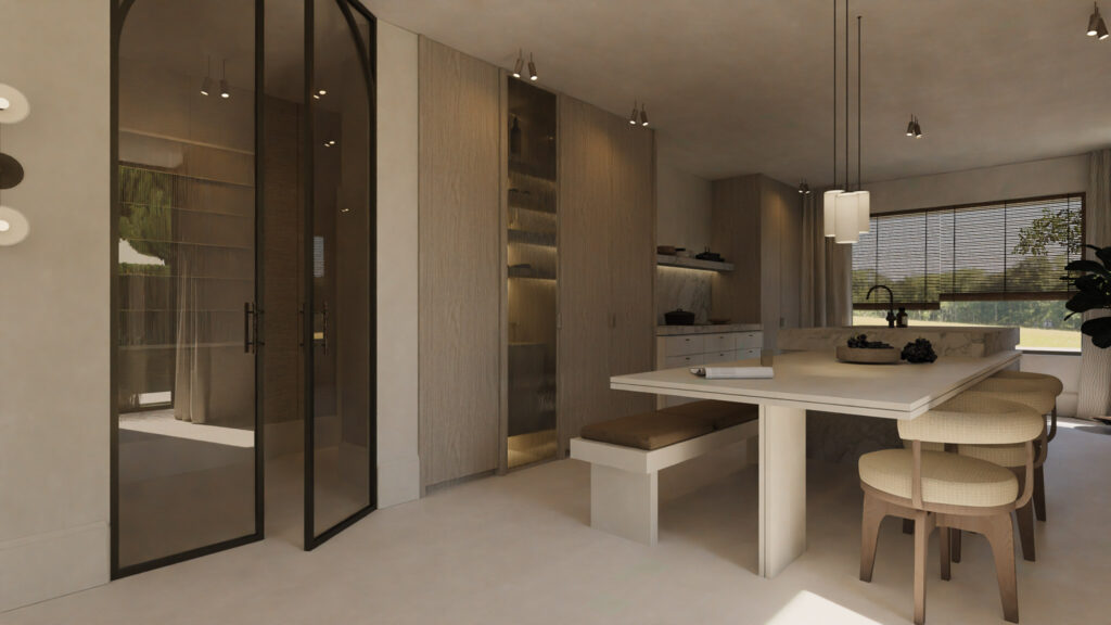 Interieur van een keuken met een marmeren kookeiland, licht houten keukenkasten, en een eetgedeelte met stoffen stoelen en hangende lampen.